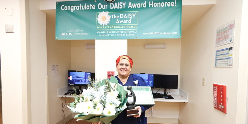 Anna Gonzalez with Daisy award